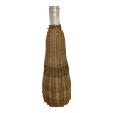 Glass and woven rattan bottle