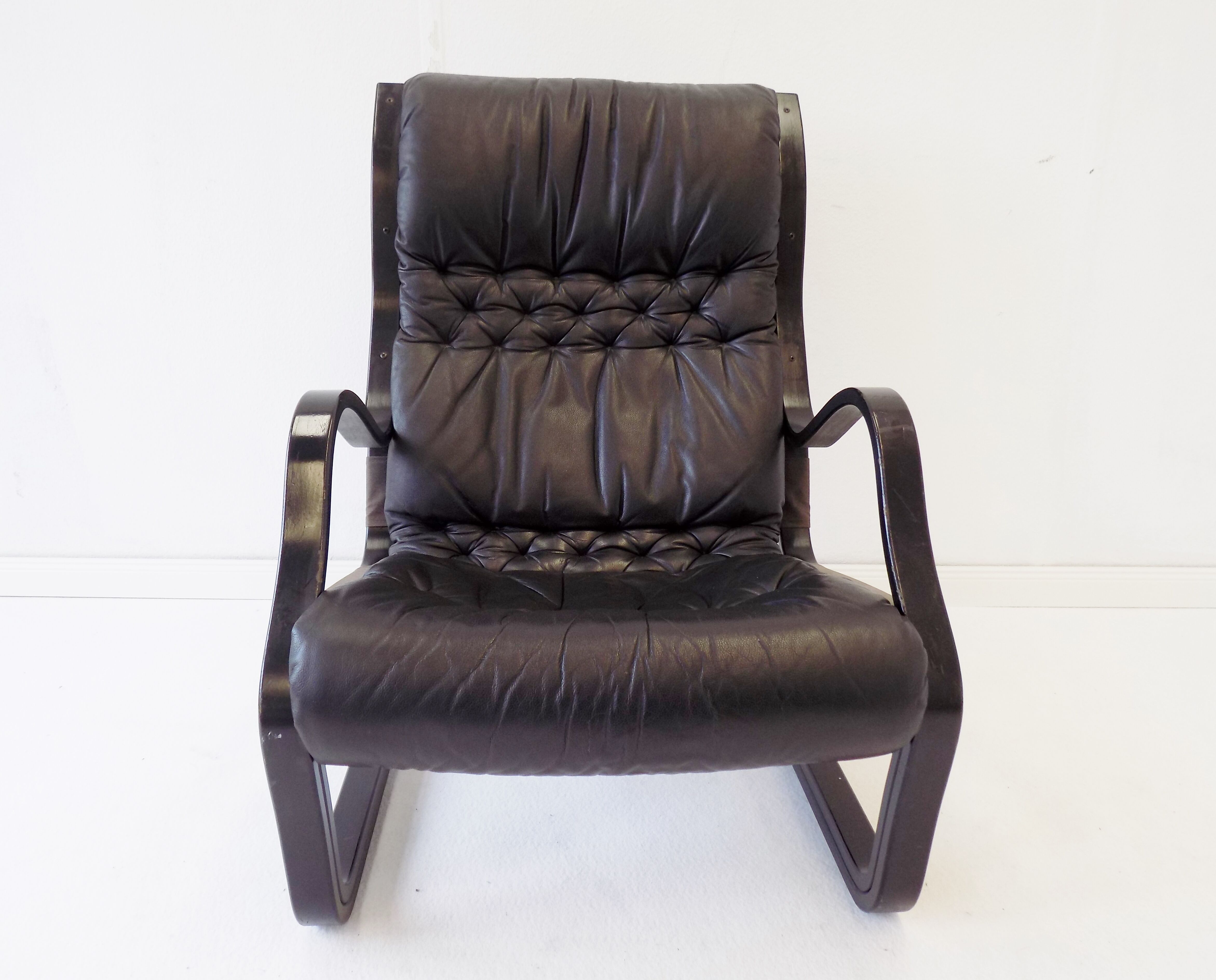 Asko Koivutaru black leather armchair by Esko Pajamies