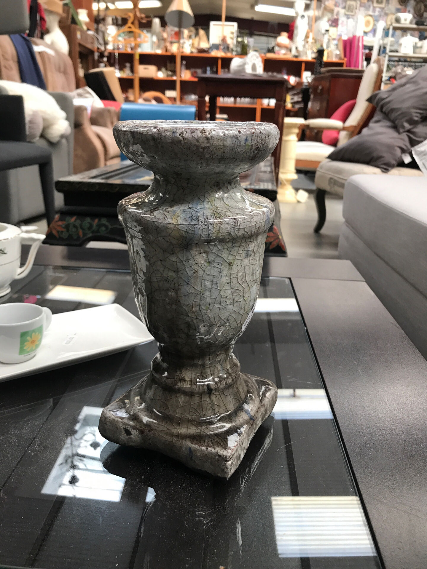 Ceramic candle holder in "Raku" style, blue-grey crackled.