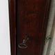 Armoire haute Art Déco française avec porte vitrée et compartiment caché, vers 1910