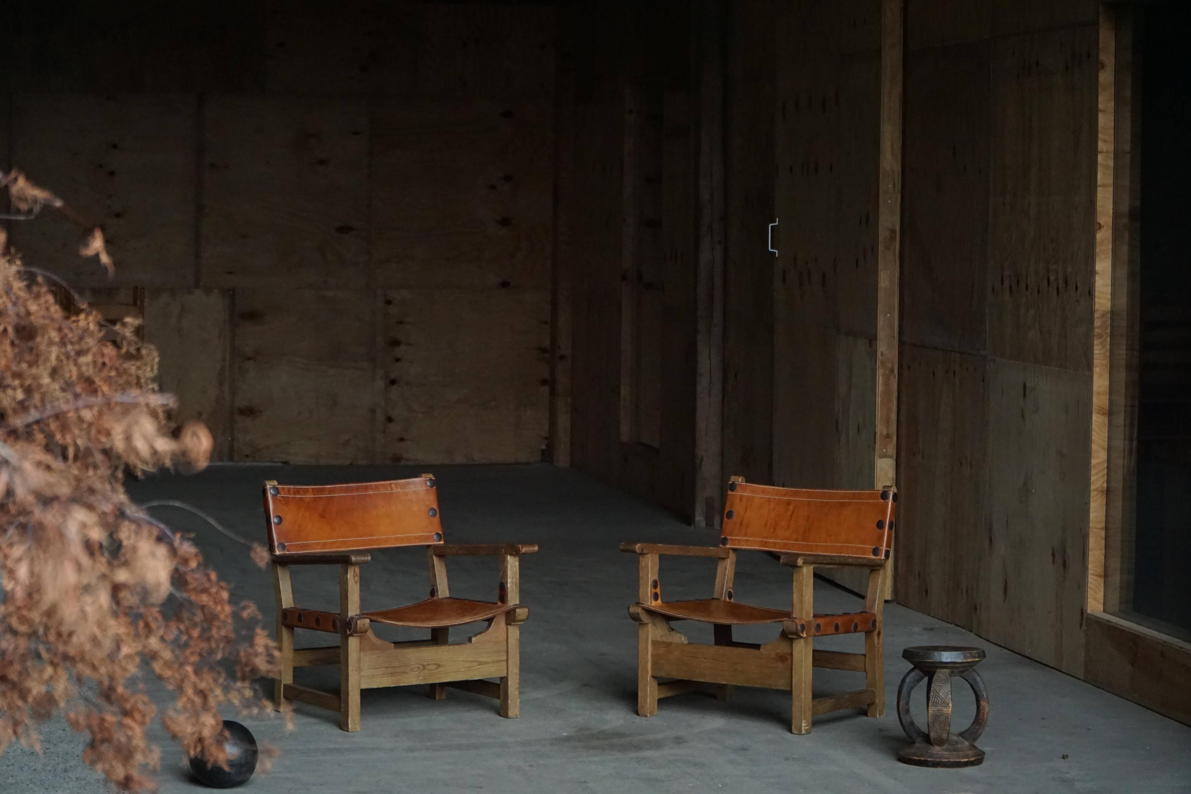 Pair of Spanish brutalist armchairs from the 1960s, wood and leather.
