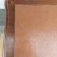 Louis XV style desk in wood, with a brown leather top.