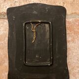 Vintage hanging decorative plate in lava stone