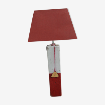 Red and white patinated wooden lamp