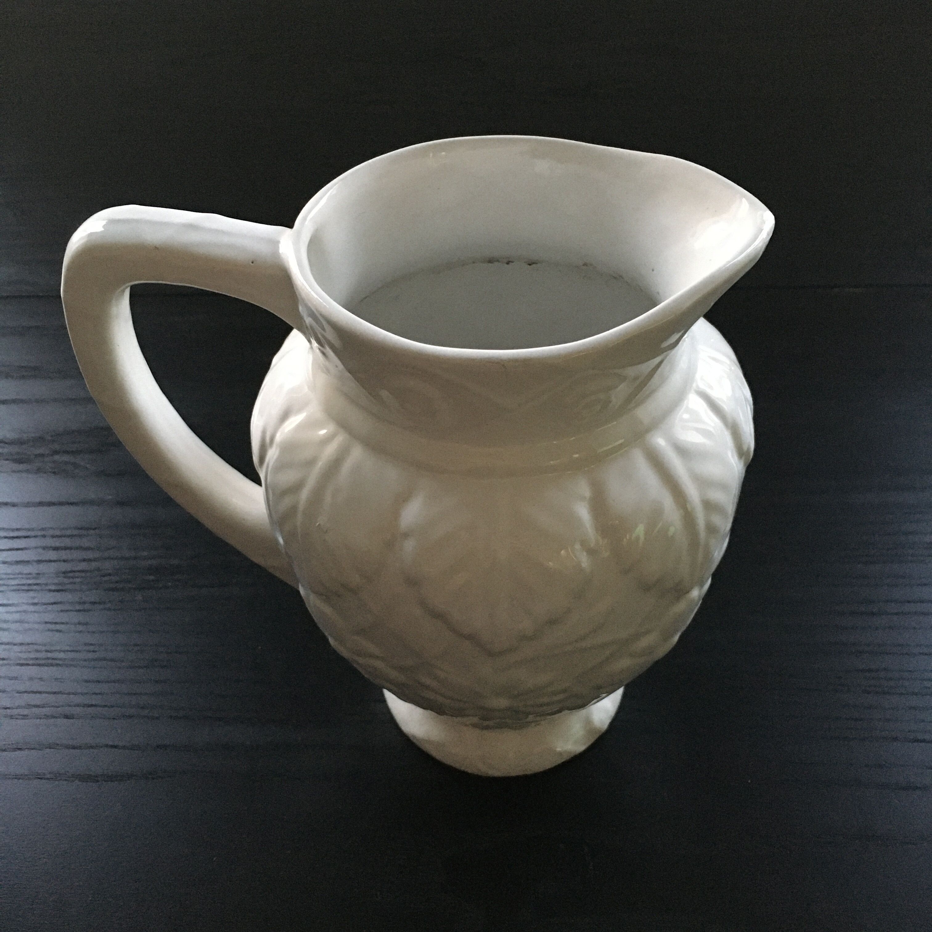White slipware pitcher