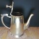 Art deco teapot in silver metal and vermeil reflections