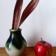 small green and cream glazed ceramic vase