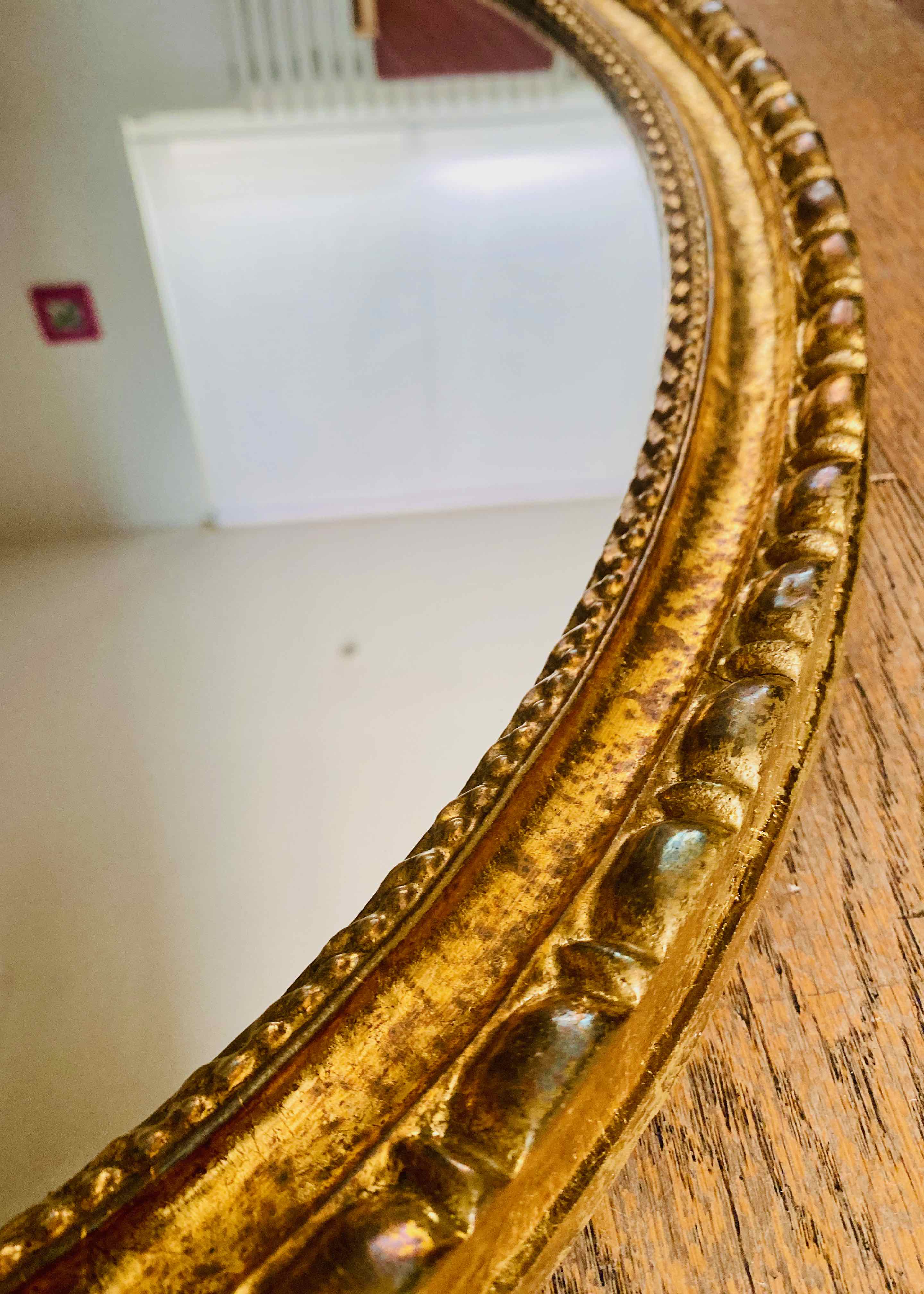 Miroir ovale doré, années 50/60