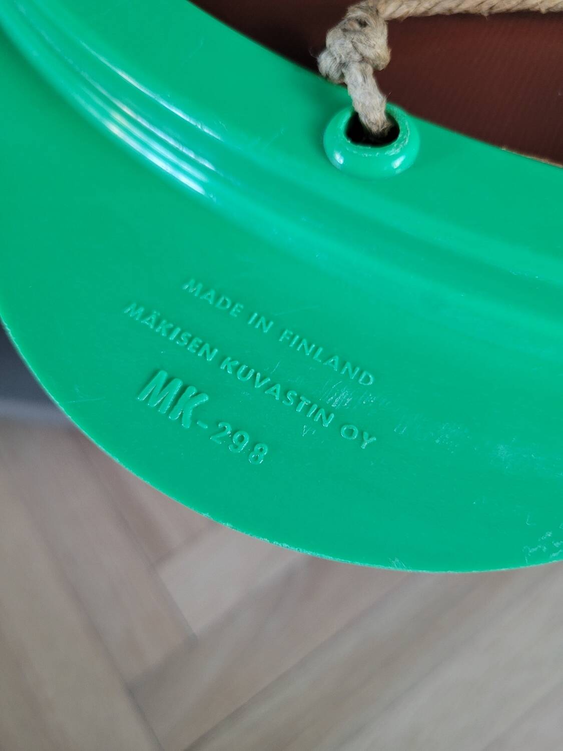 Plastic flower mirror by Finnish designer Makisen Kuvastin