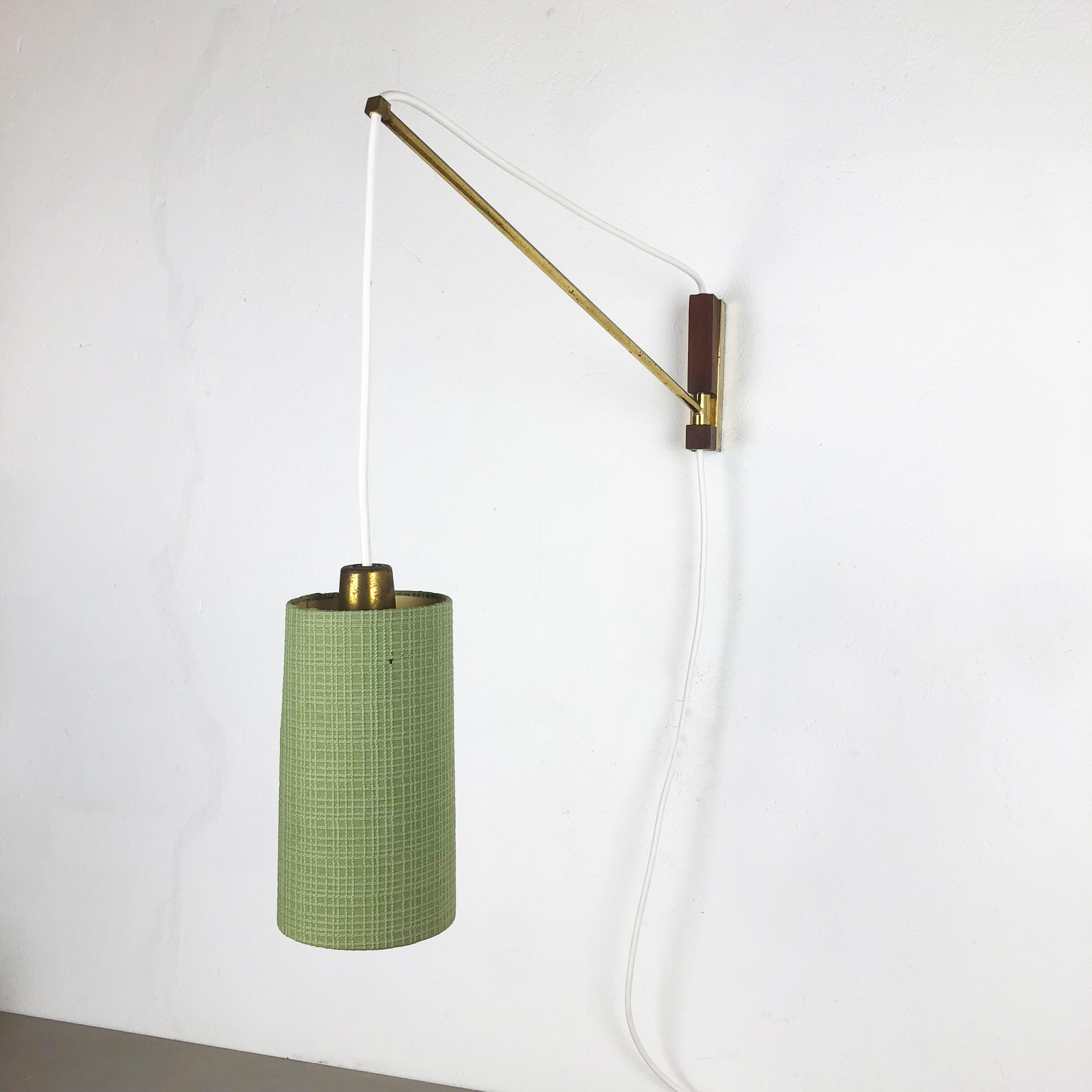 Danish brass and teak wall light, Denmark, 1960s