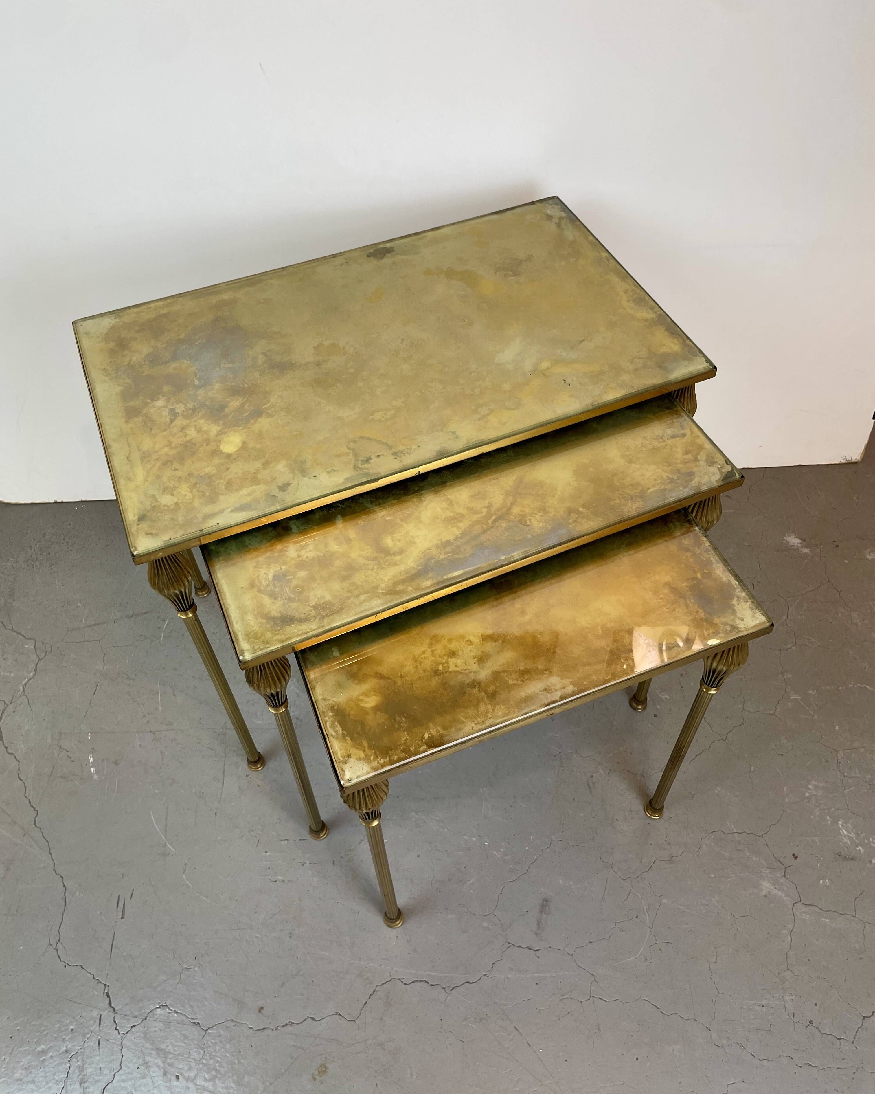 Nested brass tables, attributed to Maison Baguès, France, 1950–60.