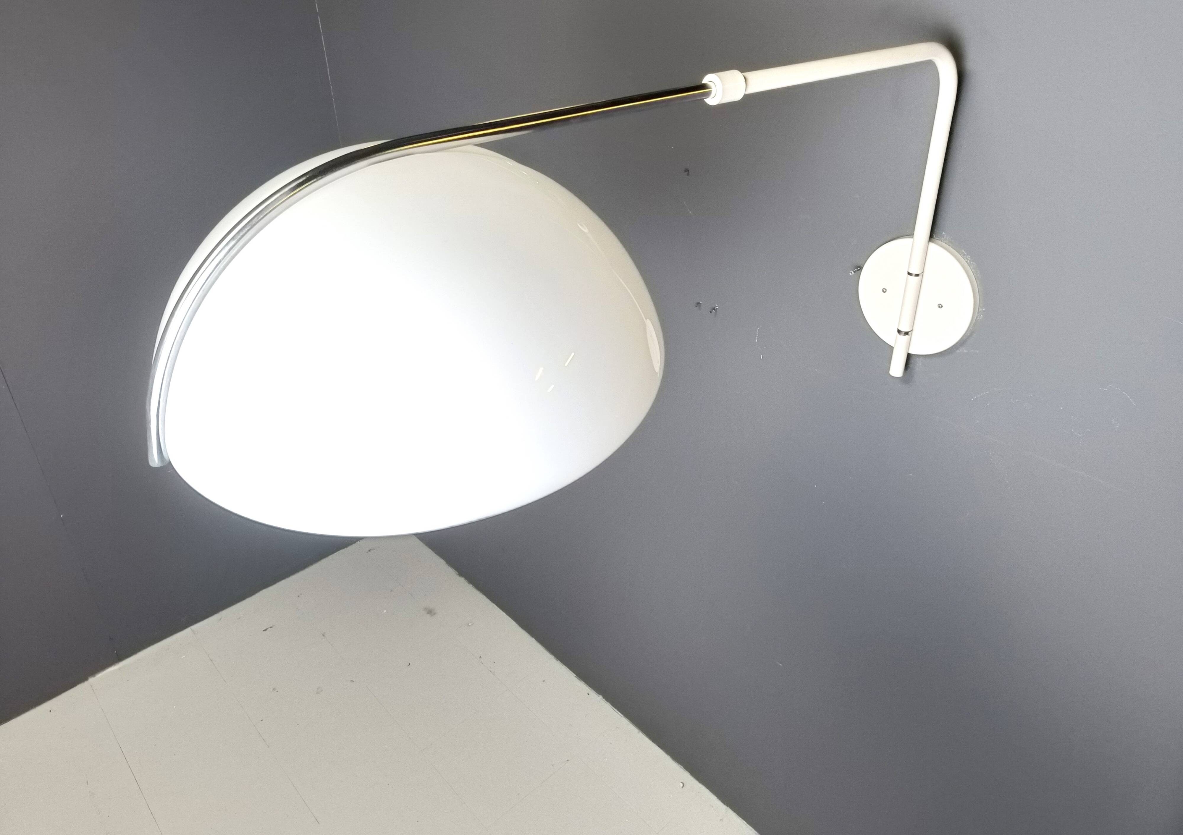 Vintage wall lamp by Luigi Massoni for Guzzini, 1970s