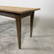 Old farmhouse table with tapered legs, late 19th to early 20th century.