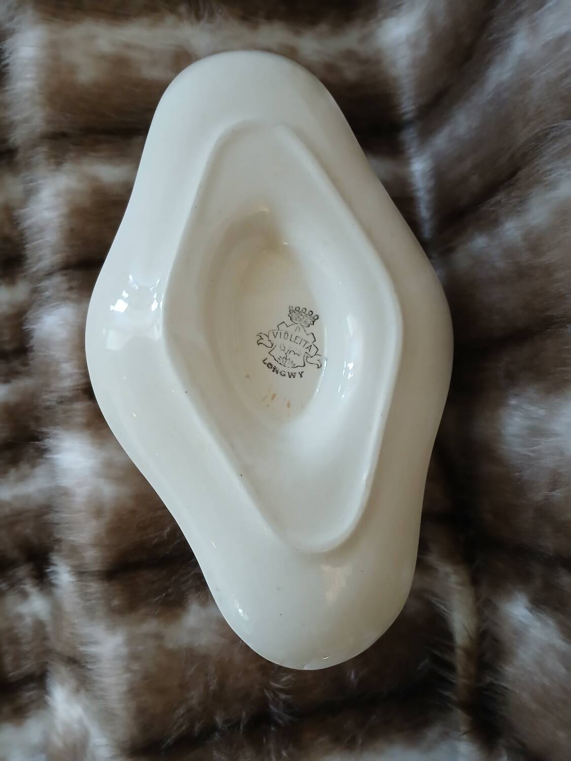 Antique sauce boat in Longwy ironstone.