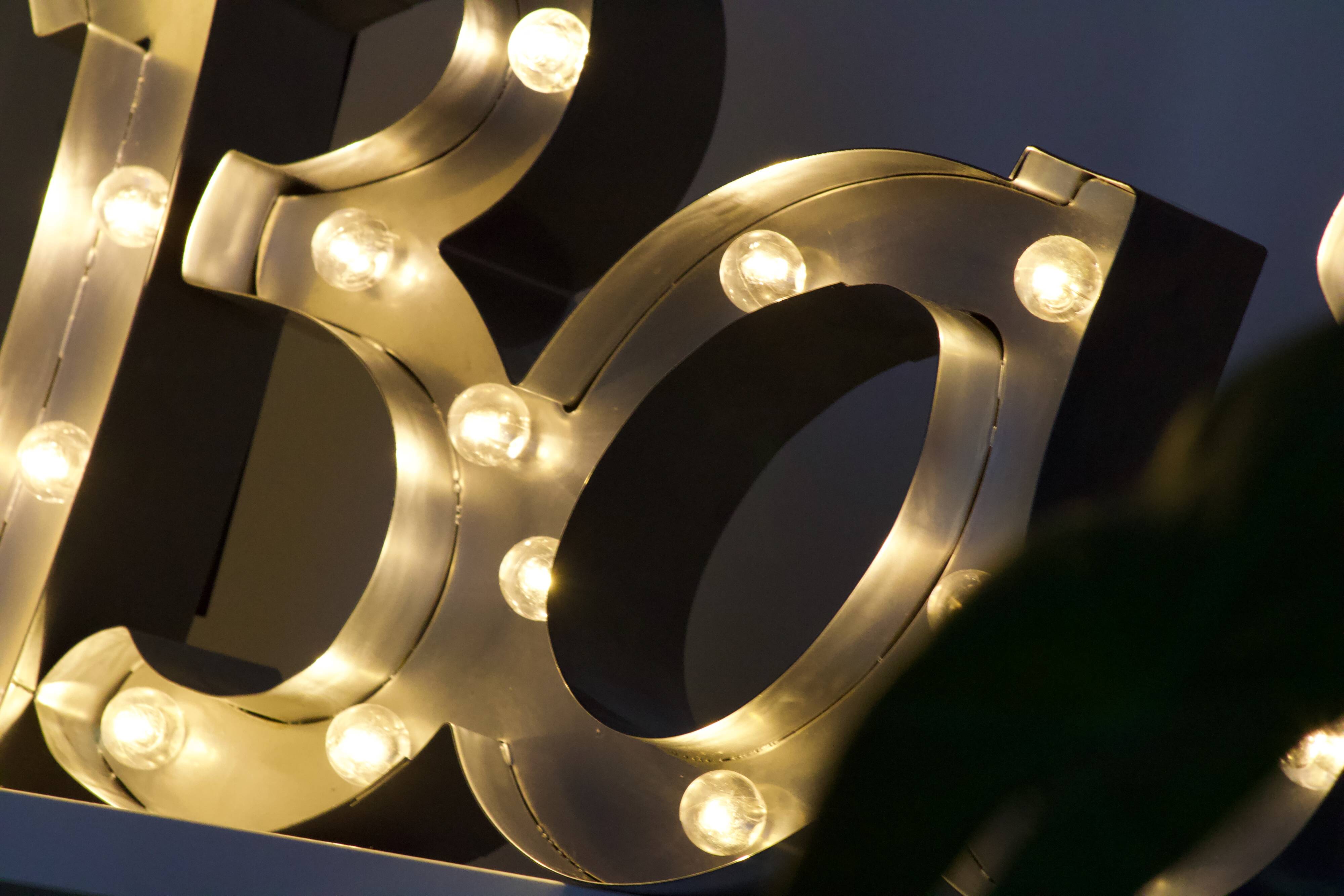 Ancient Light Sign in aluminium lettering forming the word "BAR"