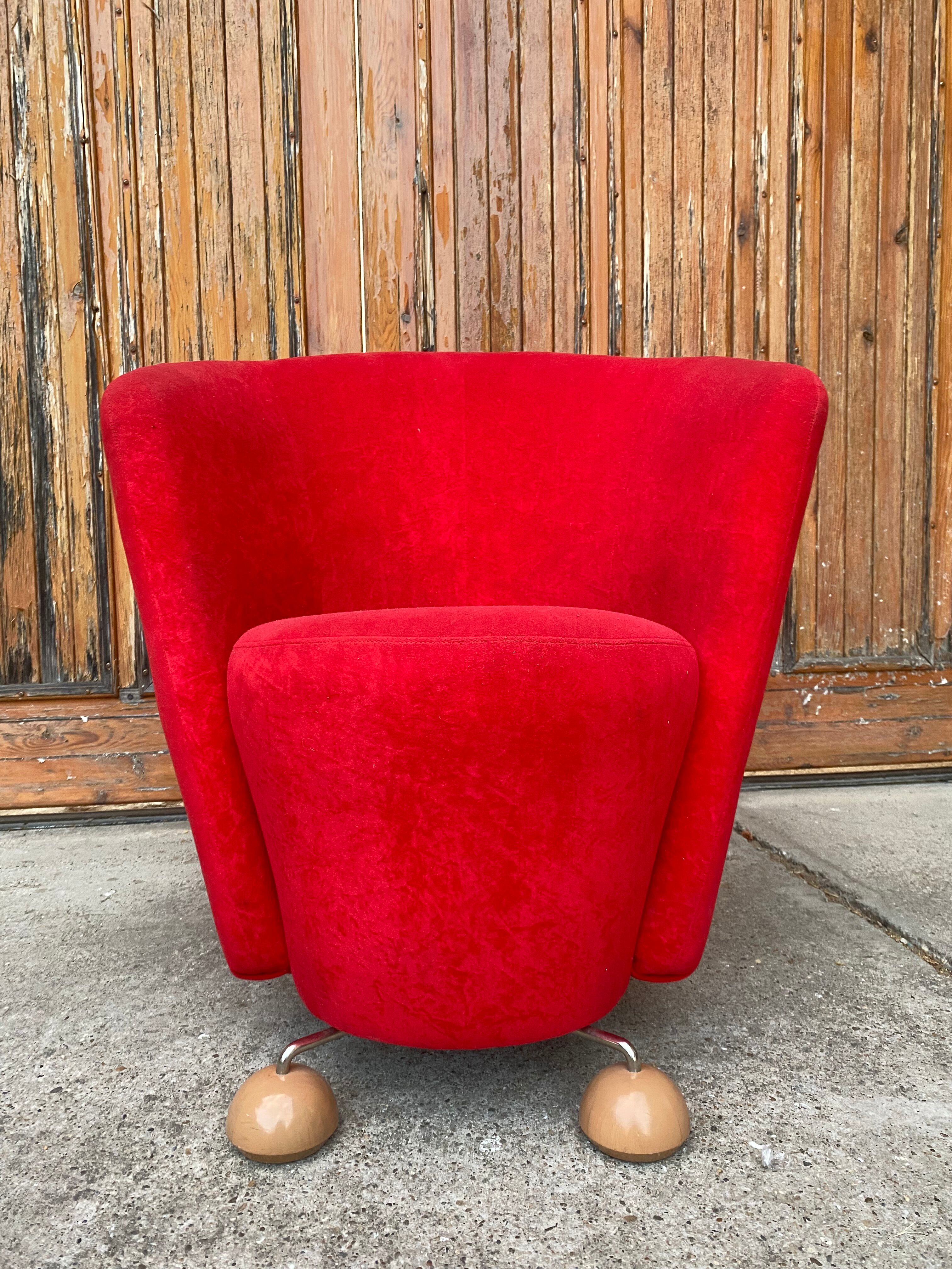 Mid-century red armchair with special legs