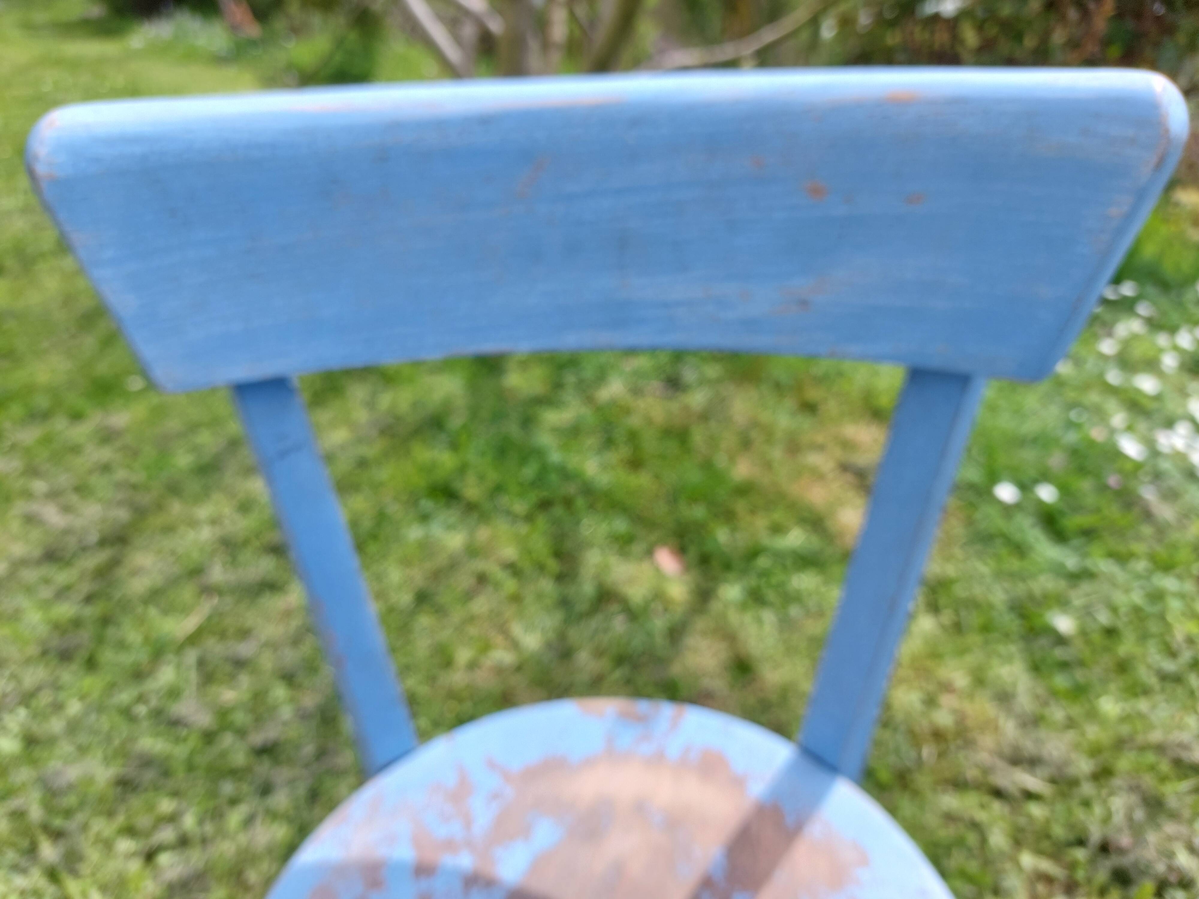 pair of chippy blue paint bistro chairs