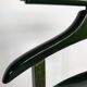 Vintage children's room valet in green varnished wood on roulette