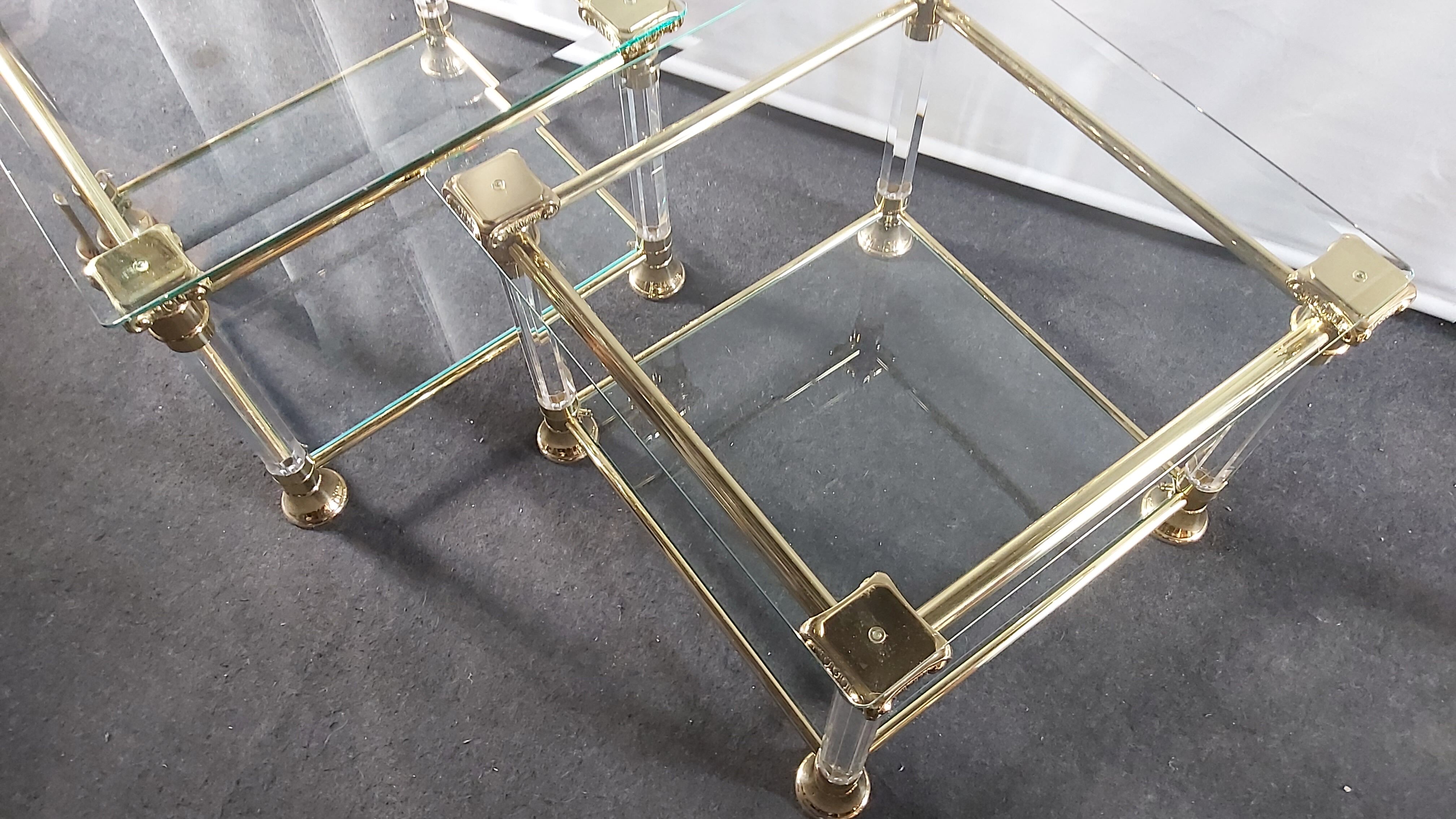 Pair of tables in brass, acrylic and glass