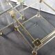 Pair of tables in brass, acrylic and glass