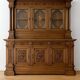 Two-body buffet, made of richly carved solid walnut.