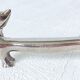 Silver metal dogs, 12 knife holders excellent condition