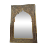 Golden oriental mirror