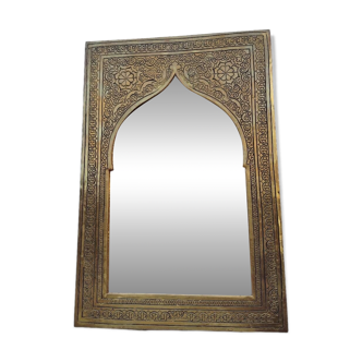Golden oriental mirror