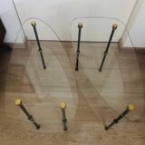 2 small side tables in glass and Bakelite with gold nuts from the 1960s.