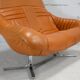 Sofa "space age". Leather, fiberglass, foam, steel. Circa 1970. Orange.