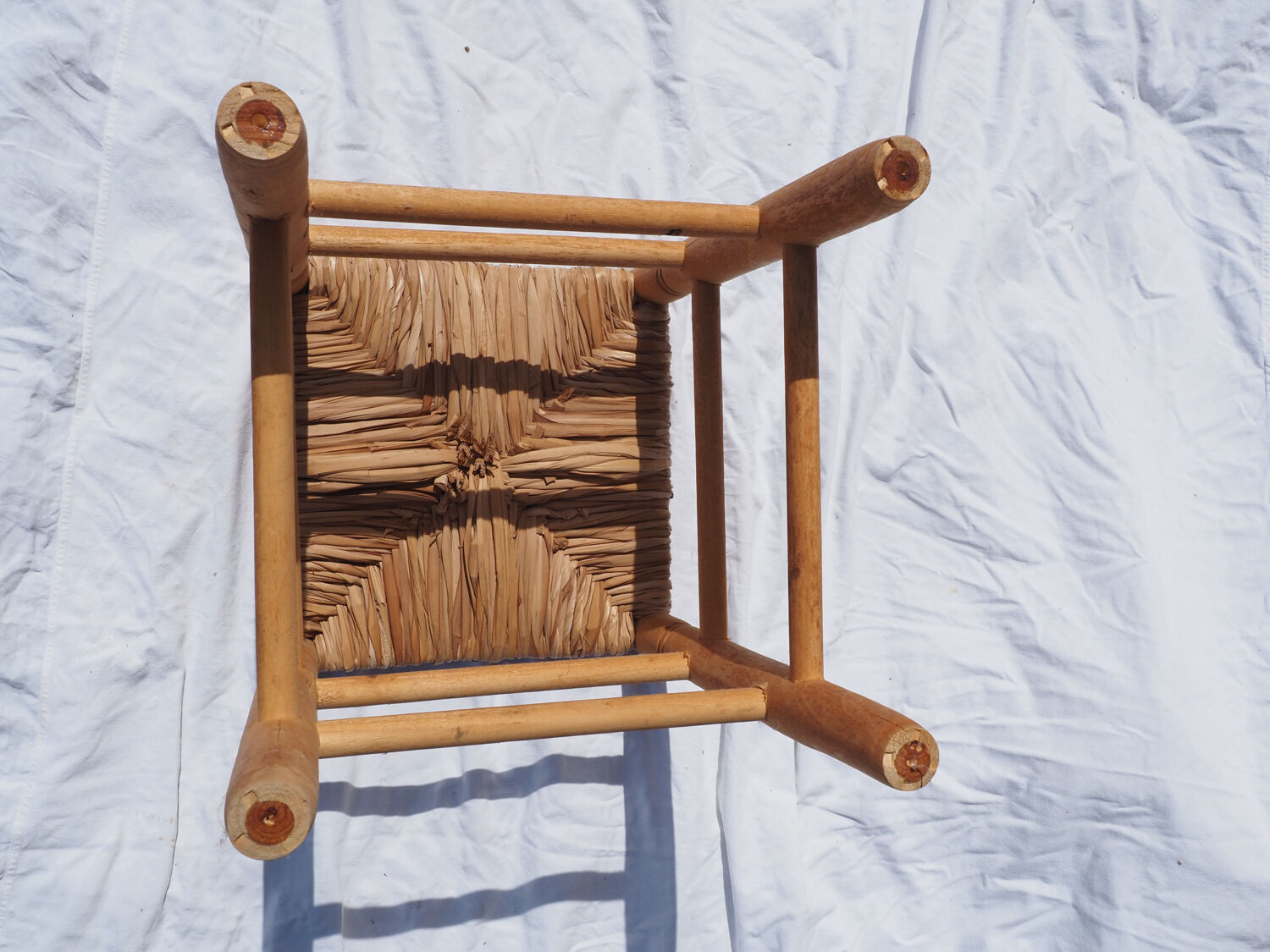 Low stool in wood and straw