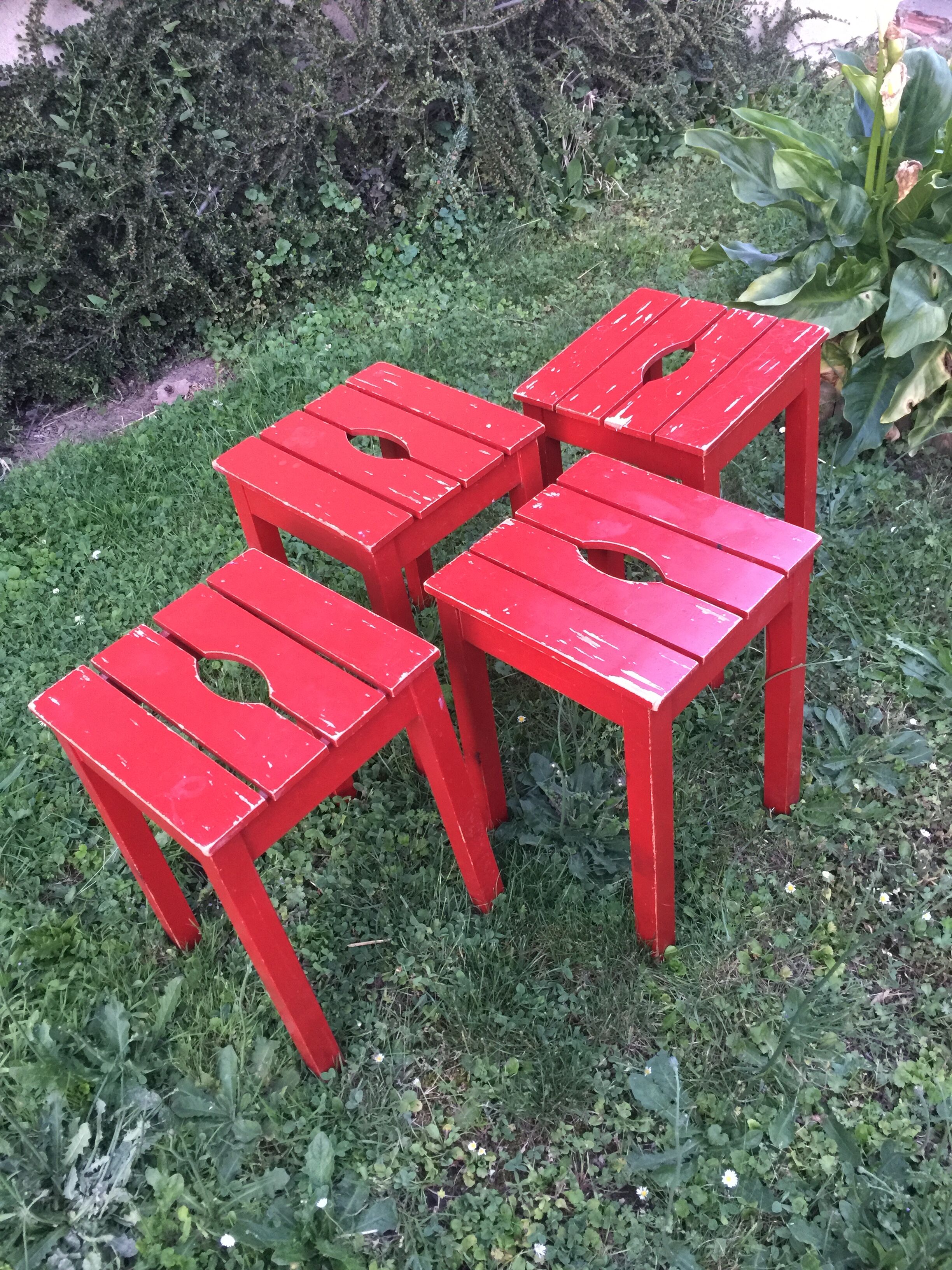 Suite of 4 vintage red stools
