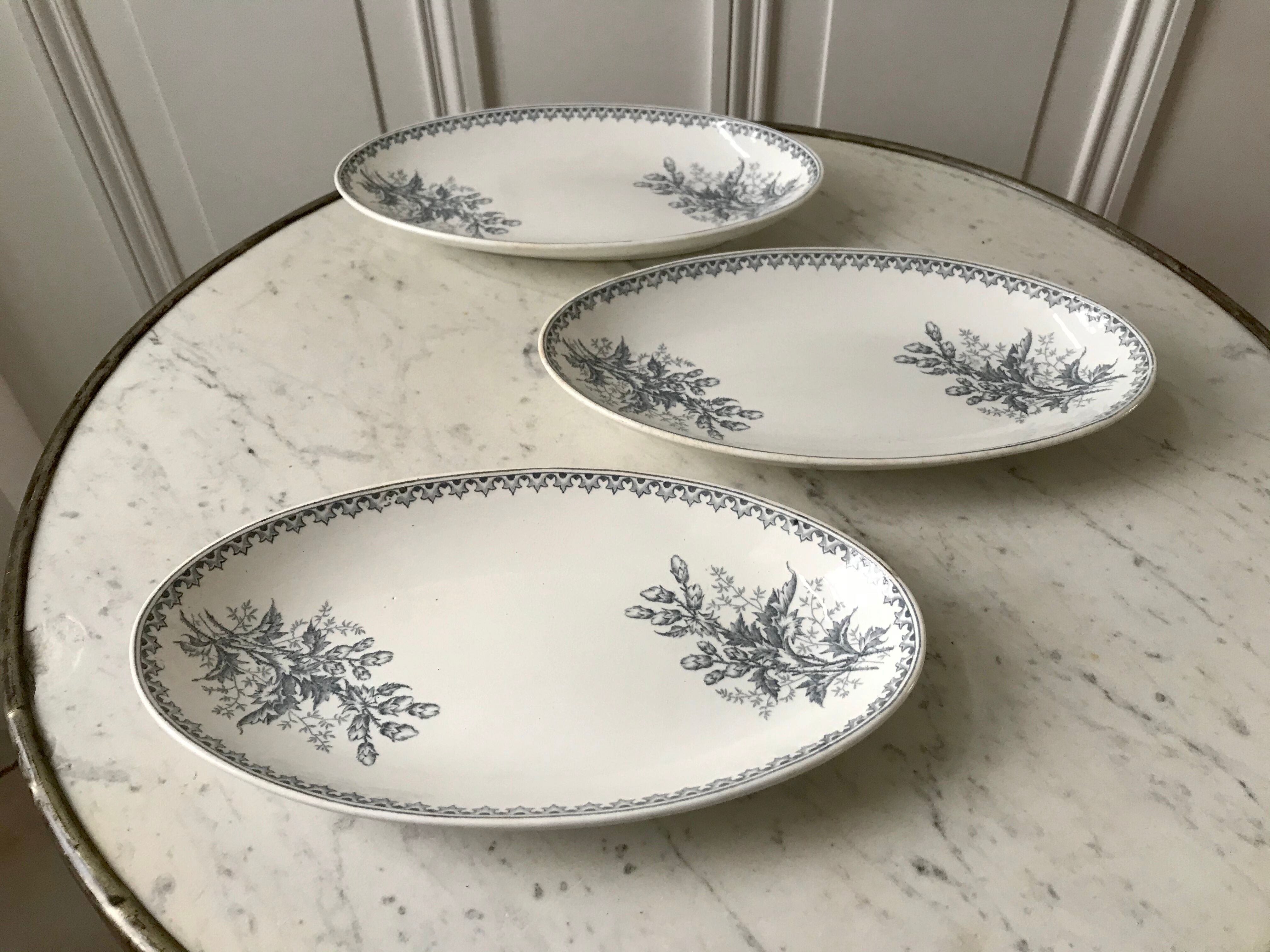 Trio of raviers Terre de Fer Société Céramique Maestricht model Thistle made in Holland late nineteenth