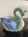 Ashtray or small planter in the shape of a swan made of Quimper earthenware.