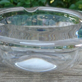 Solid half-sphere ashtray in transparent glass