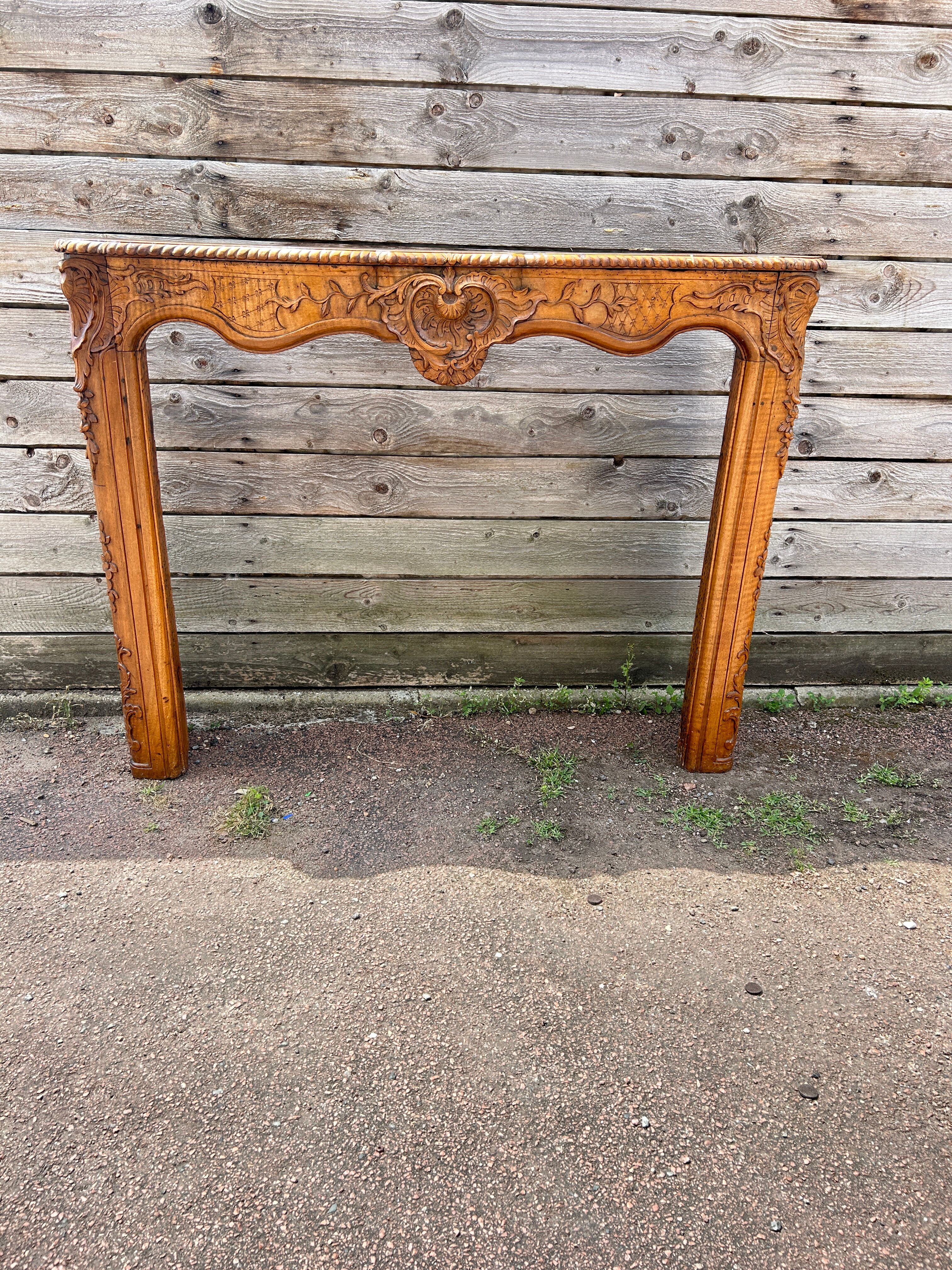 Fireplace surround in Louis XV style woodwork