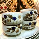 Enamelled stoneware tea bowls with plant decor
