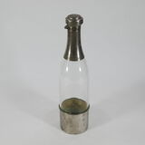 Bottle in glass and metal