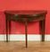 Console or half-moon gaming table with a folding top.