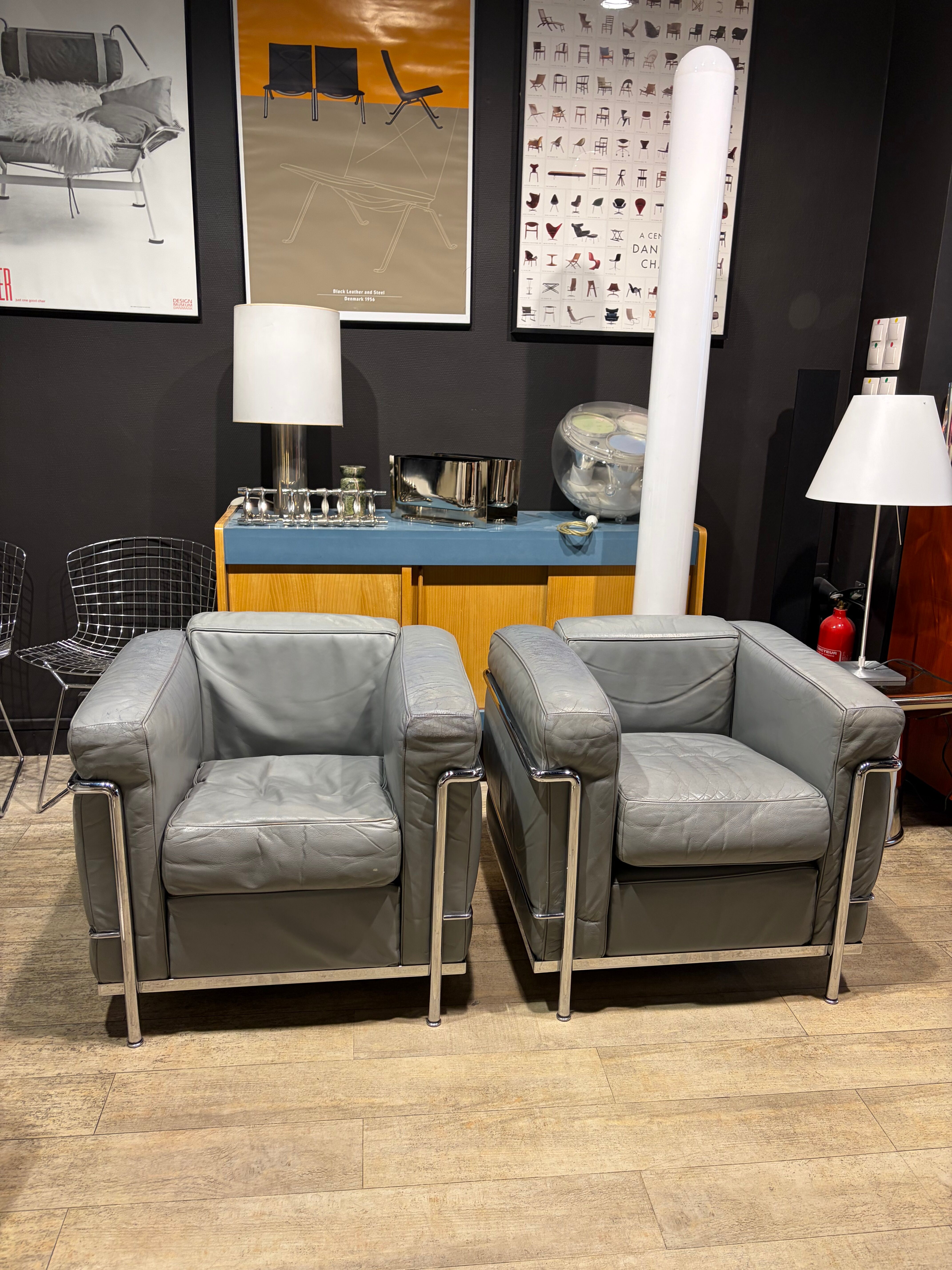 Pair of Cassina LC2 armchairs in grey leather.