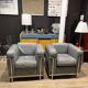 Pair of Cassina LC2 armchairs in grey leather.