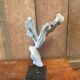 Coral on plinth