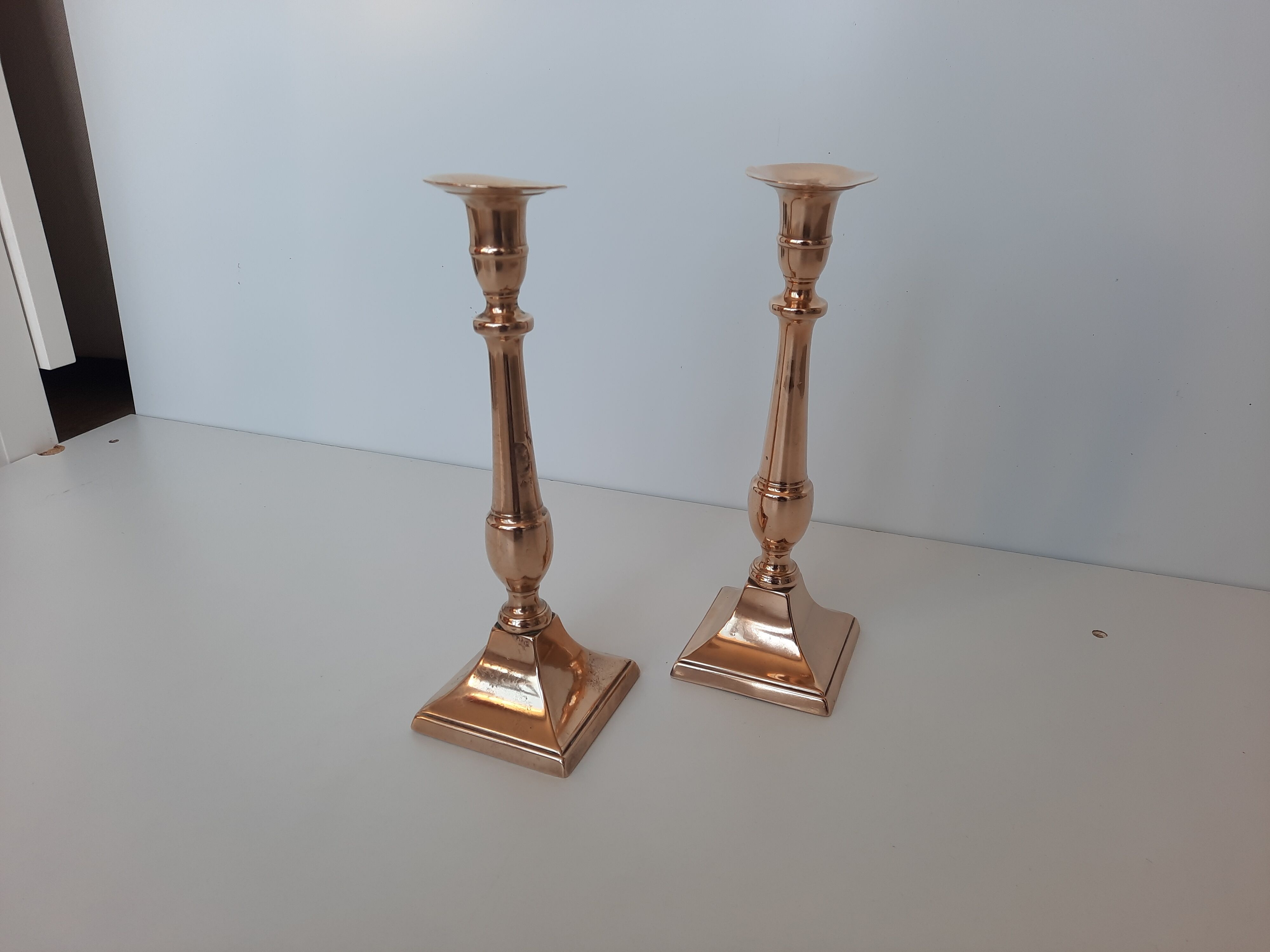 Pair of square foot copper candle holders