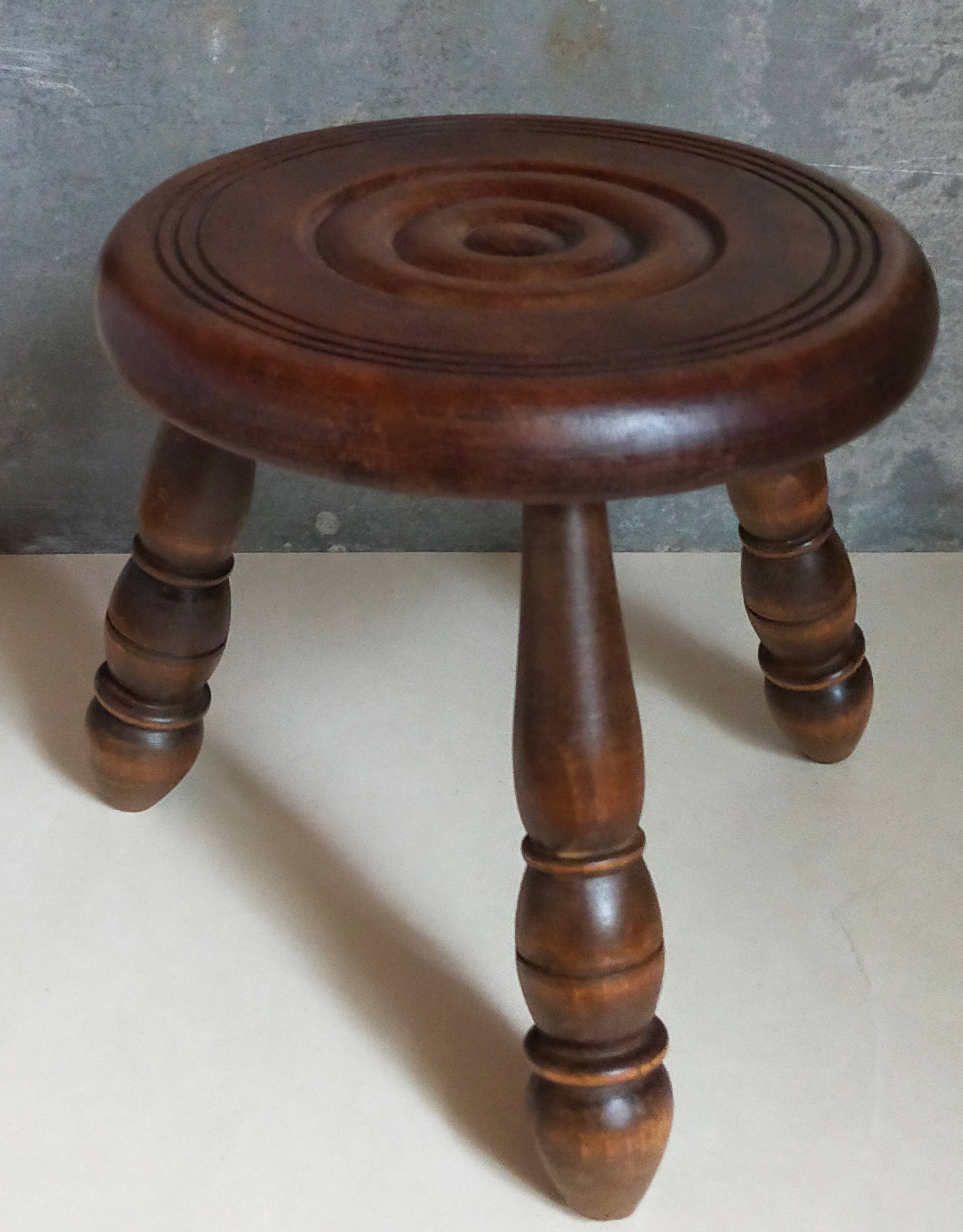 Low tripod stool in vintage turned solid wood