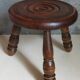 Low tripod stool in vintage turned solid wood