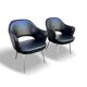 Pair of "Conference" armchairs by Eero Saarinen for Knoll International, black and chrome