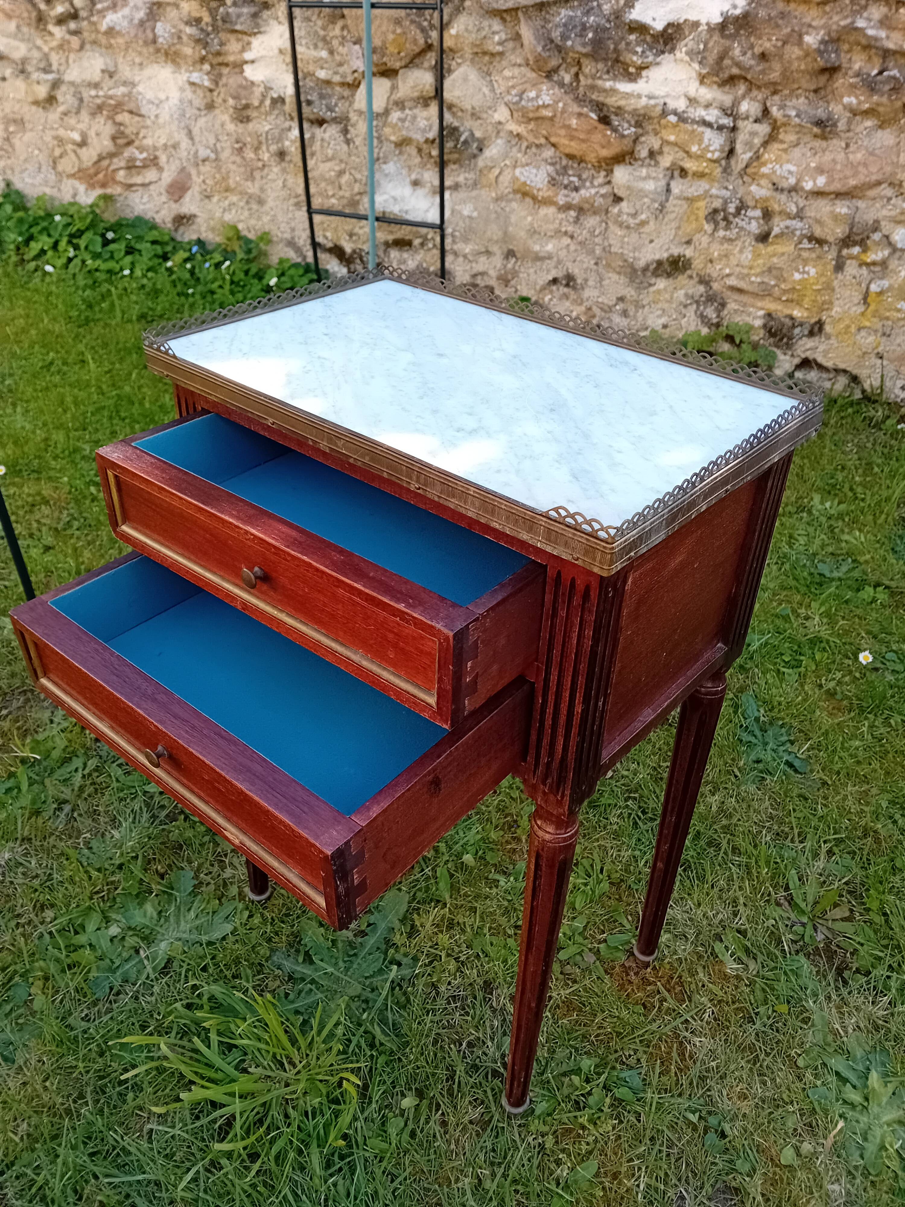 Pair of Louis XVI bedside tables.