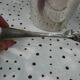 Silver metal ice bucket with its lion's pate tongs