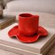 Set of wavy ceramic cup and saucer - poppy red