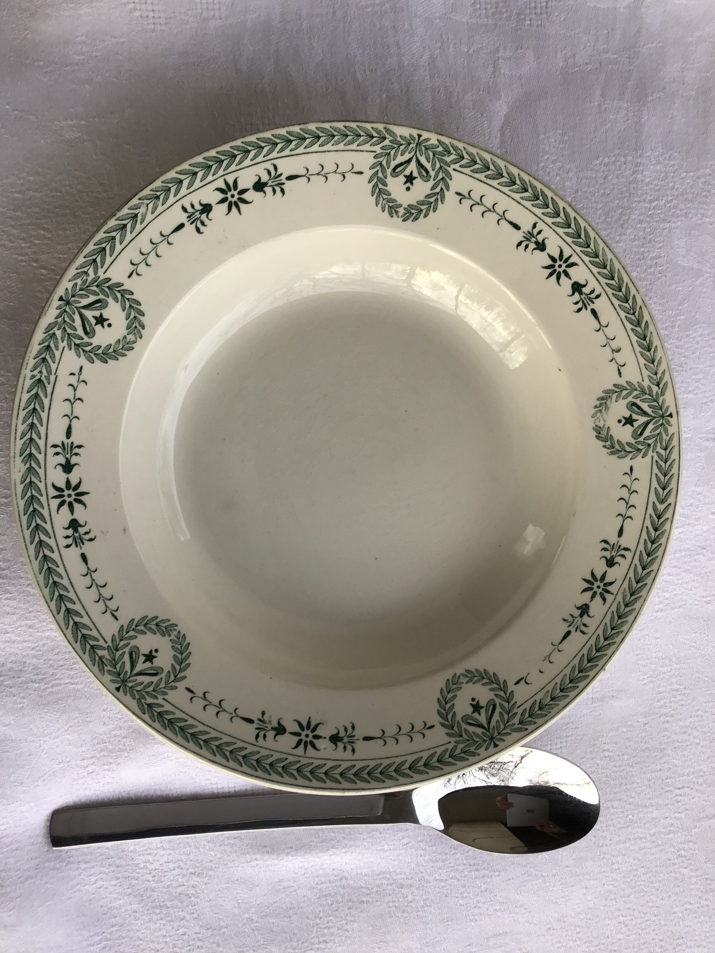 7 Old dark green Digoin hollow plates